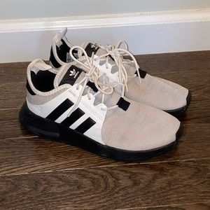 Black white and grey Adidas NMD sneakers